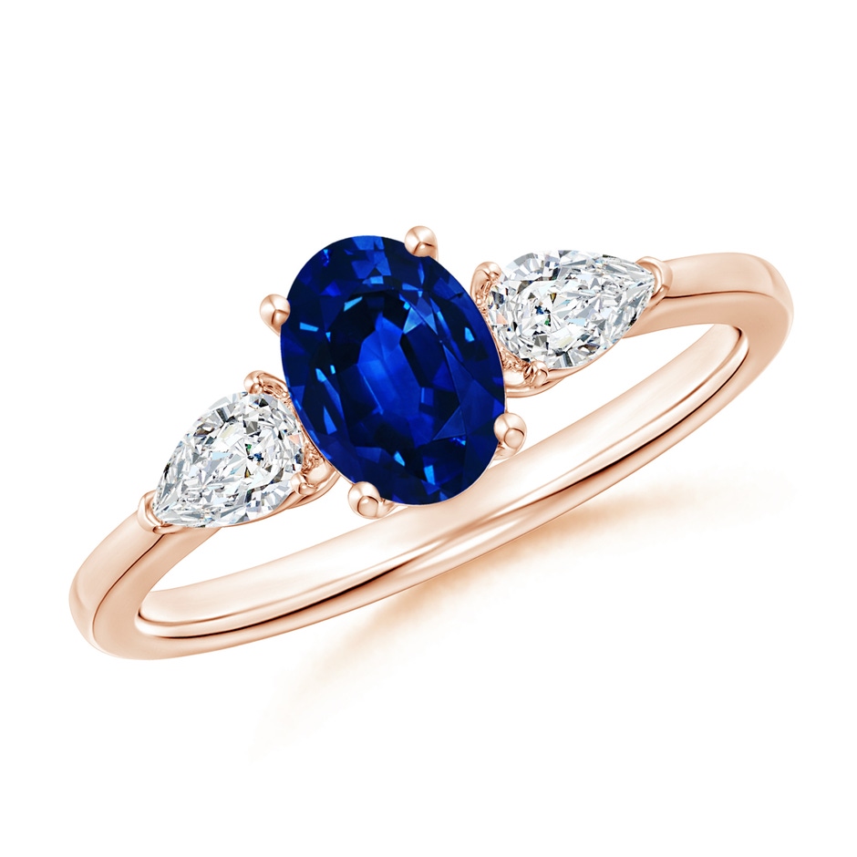 7x5mm AAAA Oval Blue Sapphire Three Stone Ring with Pear Diamonds in Rose Gold 