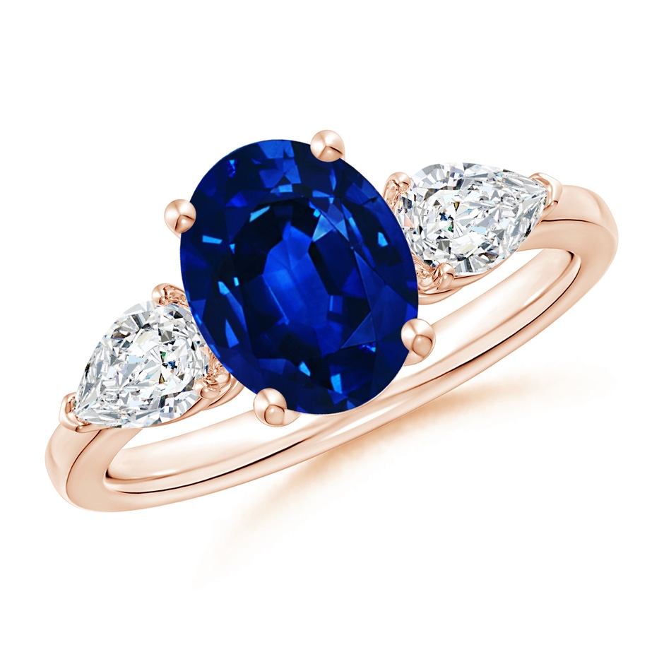 9x7mm AAAA Oval Blue Sapphire Three Stone Ring with Pear Diamonds in Rose Gold 