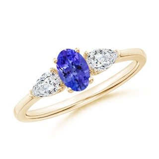 6x4mm AAAA Oval Tanzanite Three Stone Ring with Pear Diamonds in Yellow Gold