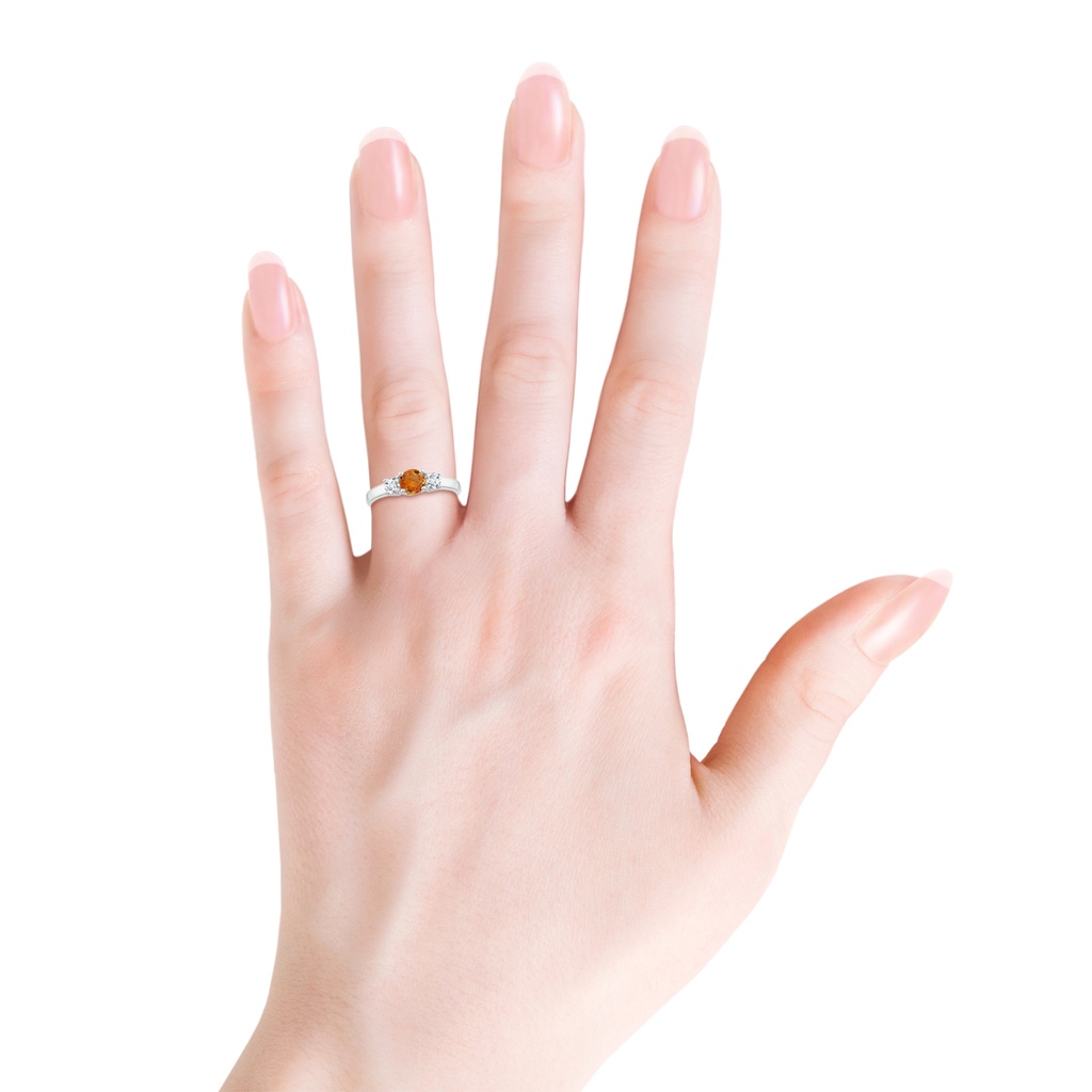 5mm AAA Classic Round Orange Sapphire and Diamond Three Stone Ring in White Gold Body-Hand