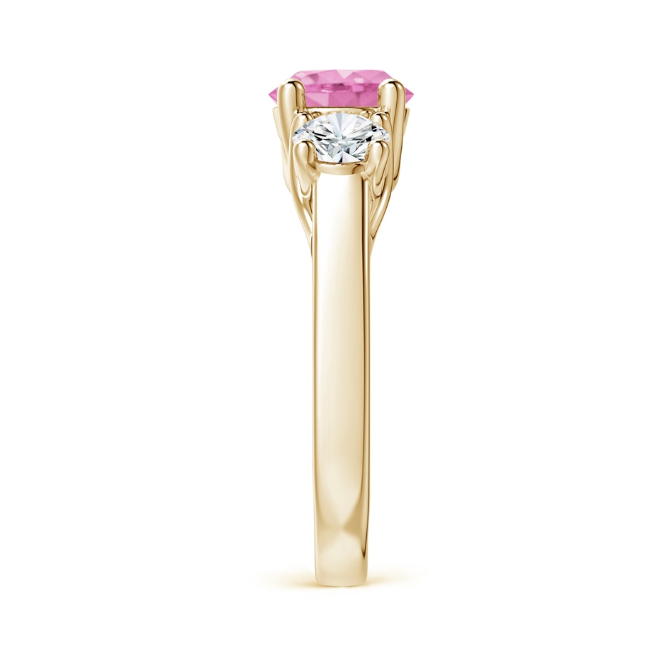 7mm A Classic Round Pink Sapphire and Diamond Three Stone Ring in Yellow Gold side 2