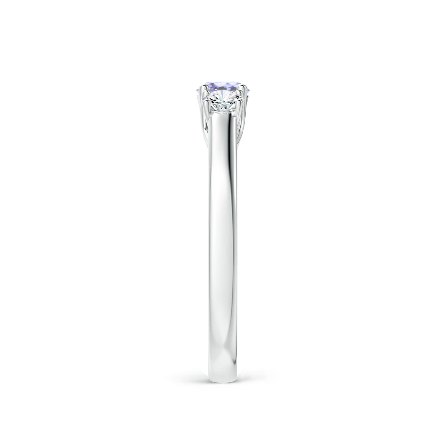 A - Tanzanite / 0.46 CT / 14 KT White Gold