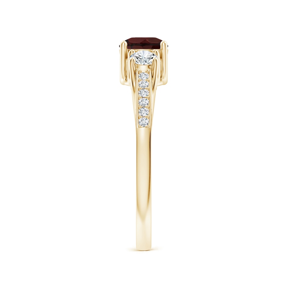 5mm A Classic Prong Set Round Garnet and Diamond Three Stone Ring in Yellow Gold side 299
