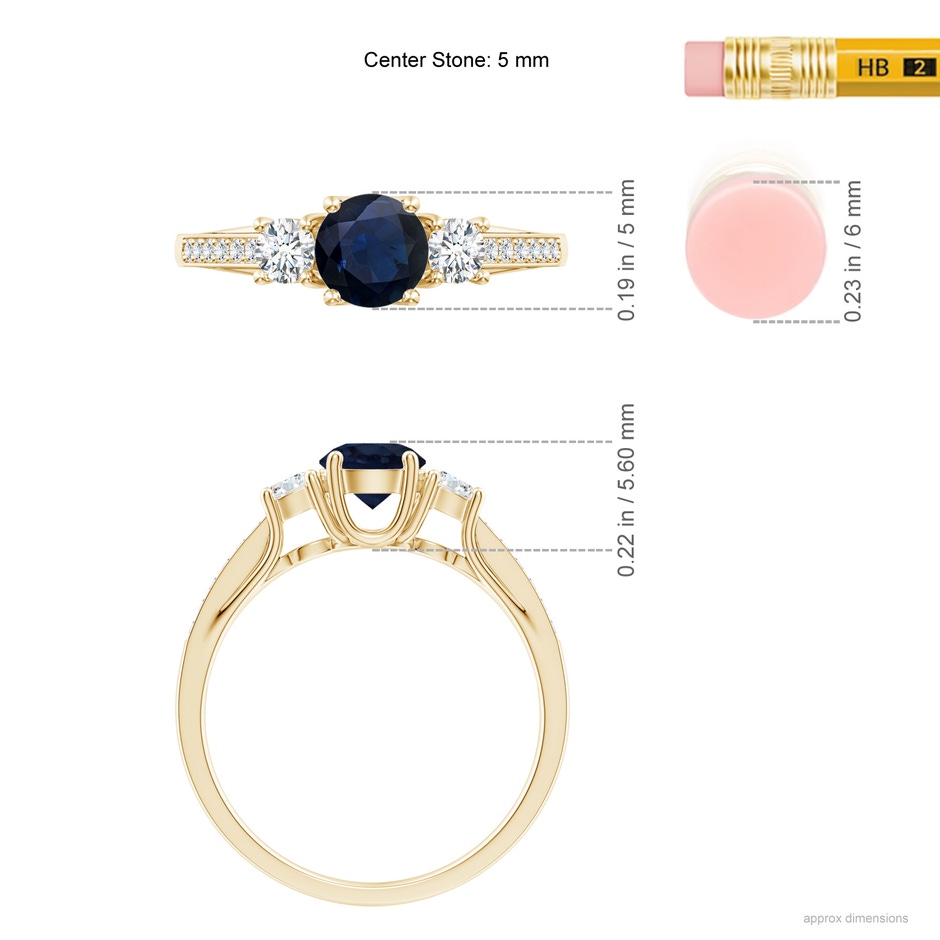 5mm A Classic Prong Set Round Blue Sapphire and Diamond Three Stone Engagement Ring in Yellow Gold ruler