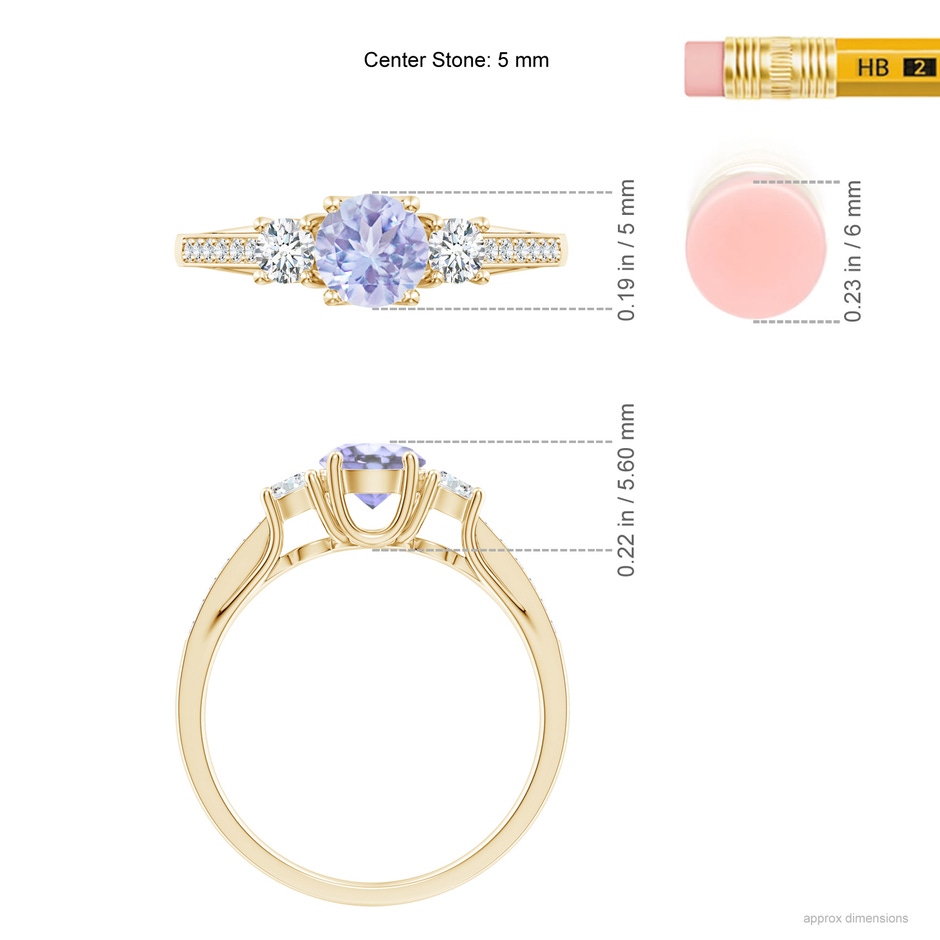 5mm A Classic Prong Set Round Tanzanite and Diamond Three Stone Ring in Yellow Gold ruler