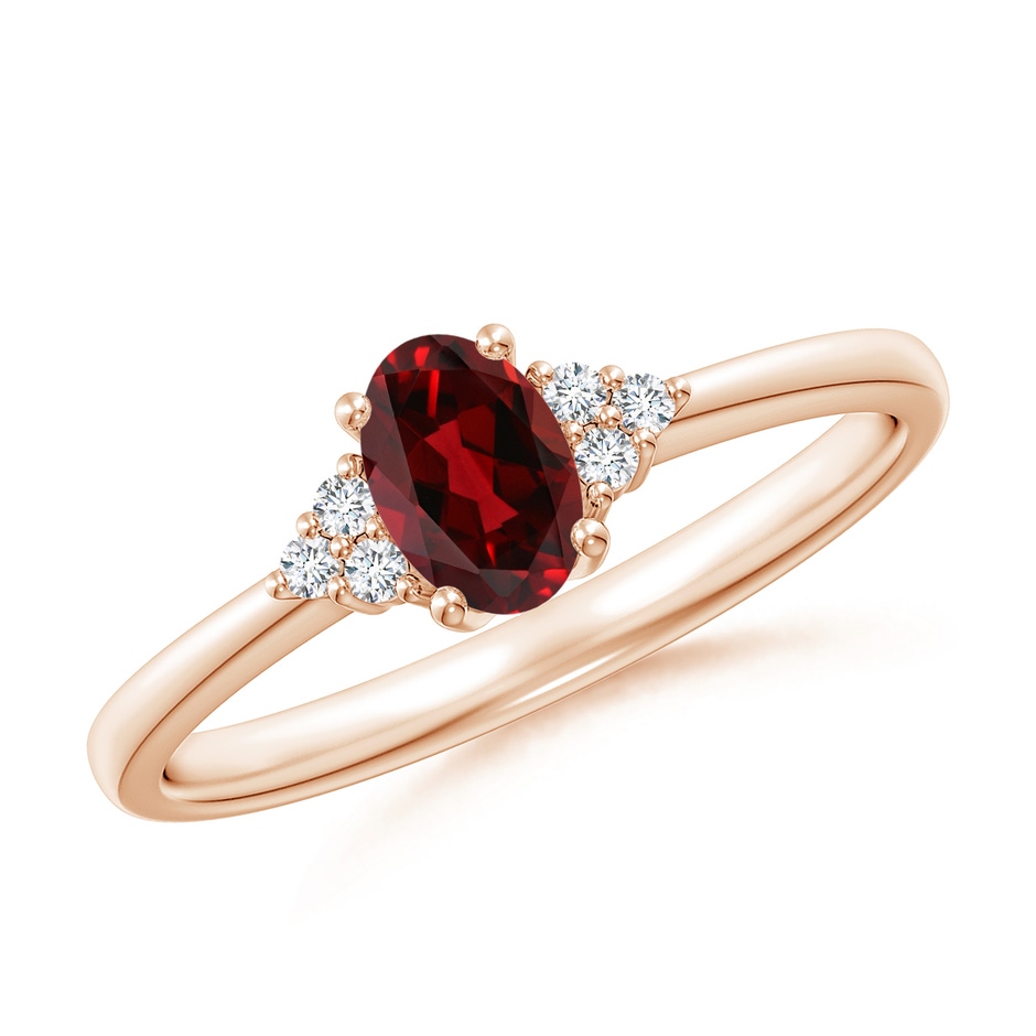 6x4mm AAAA Solitaire Oval Garnet Ring with Trio Diamond Accents in Rose Gold 