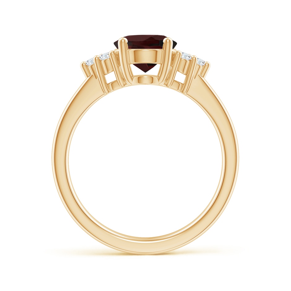 9x7mm A Solitaire Oval Garnet Ring with Trio Diamond Accents in Yellow Gold side 1