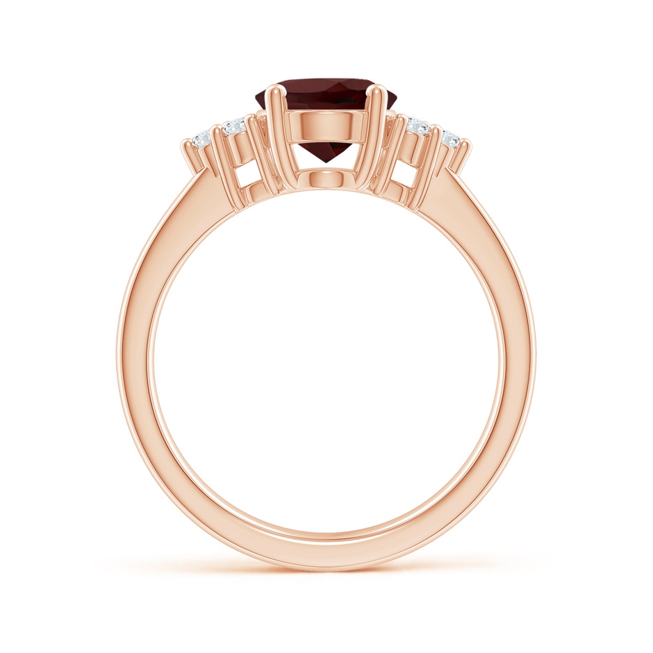 9x7mm AA Solitaire Oval Garnet Ring with Trio Diamond Accents in Rose Gold side 1