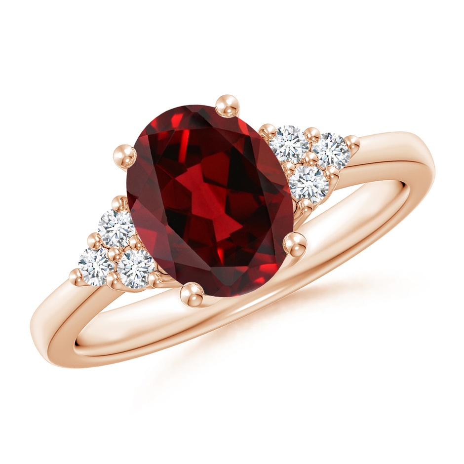 9x7mm AAAA Solitaire Oval Garnet Ring with Trio Diamond Accents in Rose Gold 
