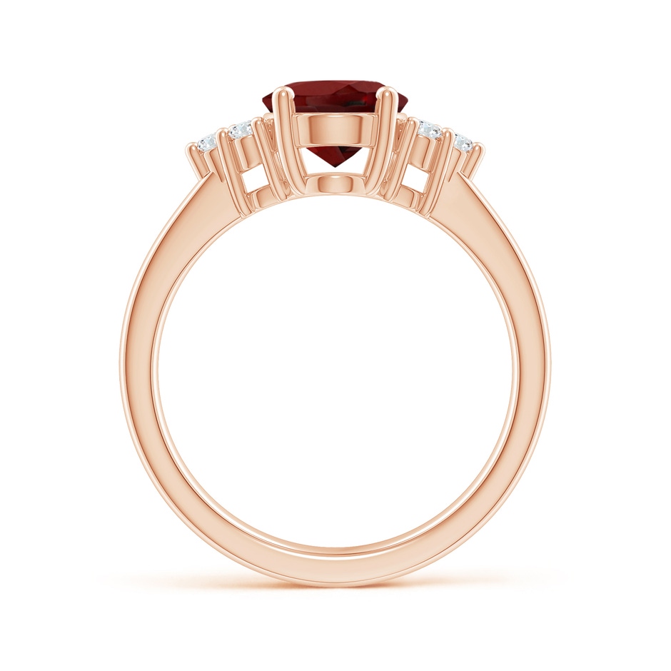 9x7mm AAAA Solitaire Oval Garnet Ring with Trio Diamond Accents in Rose Gold side 1