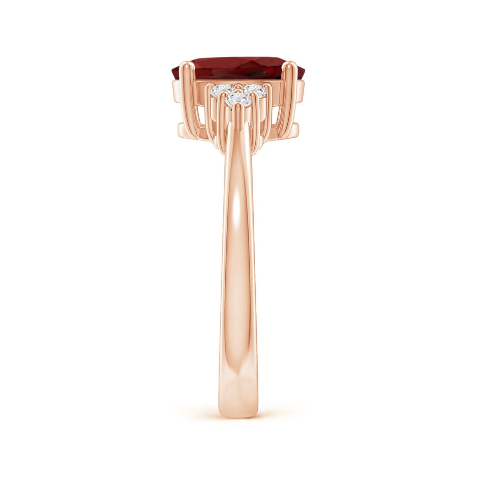 9x7mm AAAA Solitaire Oval Garnet Ring with Trio Diamond Accents in Rose Gold side 2