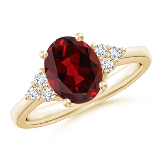 9x7mm AAAA Solitaire Oval Garnet Ring with Trio Diamond Accents in Yellow Gold