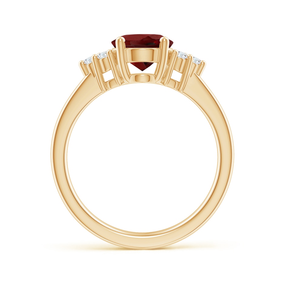 9x7mm AAAA Solitaire Oval Garnet Ring with Trio Diamond Accents in Yellow Gold side 1