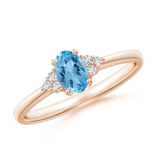 6x4mm AA Solitaire Oval Swiss Blue Topaz Ring with Trio Diamond Accents in 10K Rose Gold