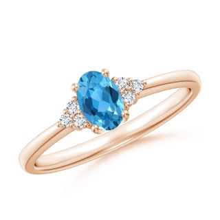 6x4mm AAA Solitaire Oval Swiss Blue Topaz Ring with Trio Diamond Accents in 10K Rose Gold
