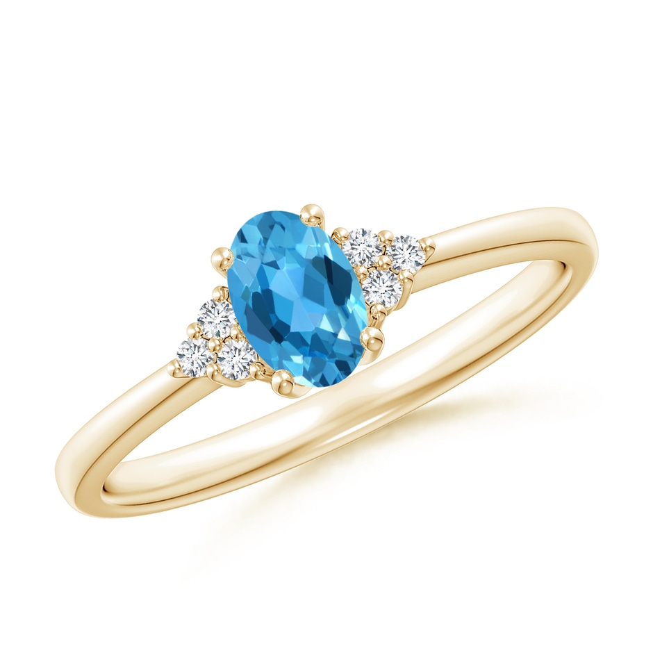 6x4mm AAA Solitaire Oval Swiss Blue Topaz Ring with Trio Diamond Accents in 9K Yellow Gold 