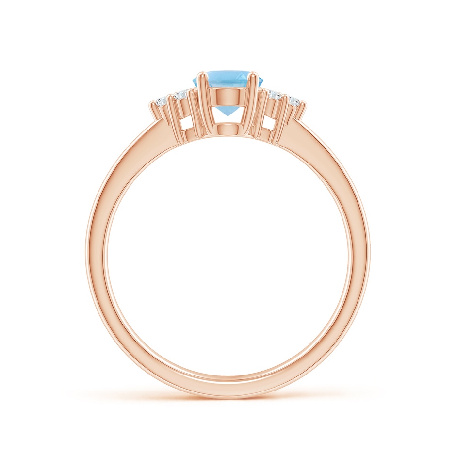 7x5mm A Solitaire Oval Swiss Blue Topaz Ring with Trio Diamond Accents in Rose Gold side 1