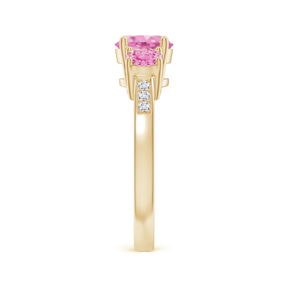 7mm A Three Stone Round Pink Sapphire Ring with Diamond Accents in Yellow Gold side-2