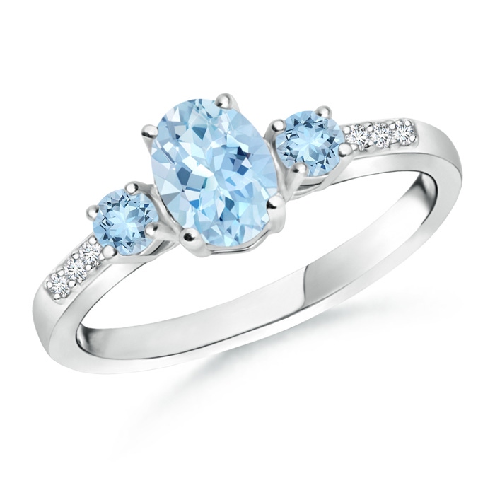 7x5mm AAA Oval Aquamarine Three Stone Ring with Diamond Accents in White Gold