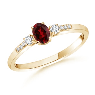 5x3mm AAAA Classic Oval Garnet and Round Diamond Three Stone Ring in Yellow Gold