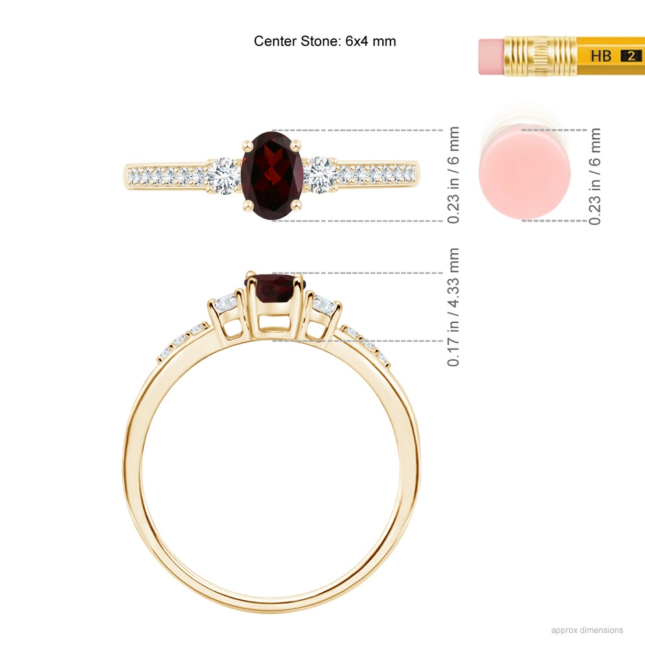6x4mm A Classic Oval Garnet and Round Diamond Three Stone Ring in Yellow Gold ruler