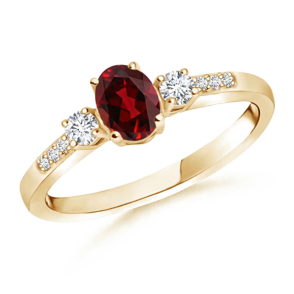 6x4mm AAAA Classic Oval Garnet and Round Diamond Three Stone Ring in Yellow Gold 