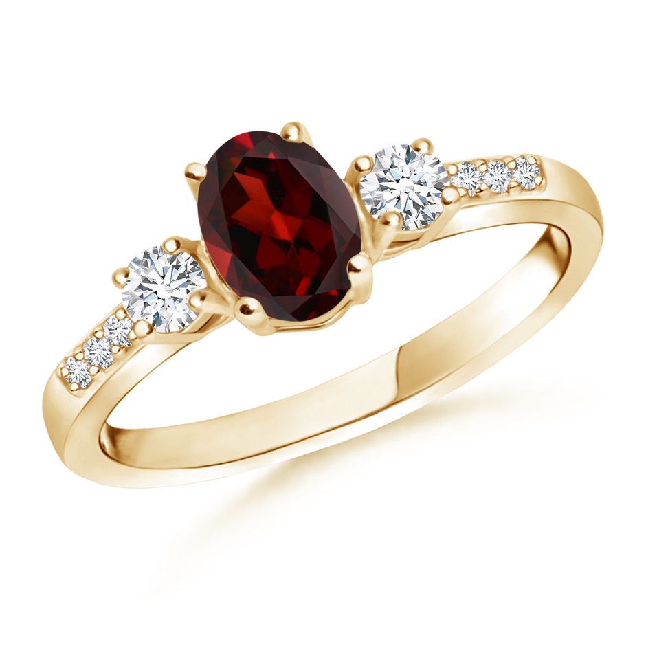 7x5mm AAA Classic Oval Garnet and Round Diamond Three Stone Ring in Yellow Gold 