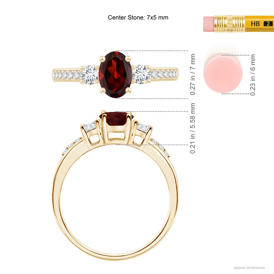 7x5mm AAA Classic Oval Garnet and Round Diamond Three Stone Ring in Yellow Gold ruler