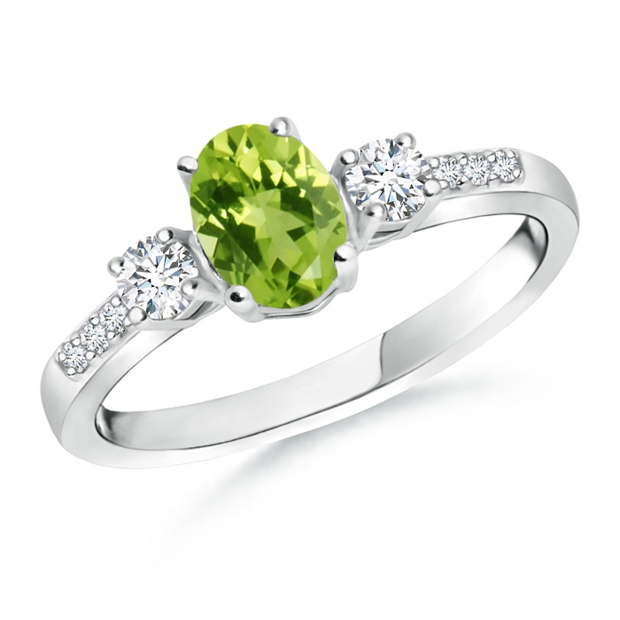 7x5mm AAA Classic Oval Peridot and Round Diamond Three Stone Ring in White Gold