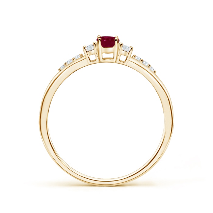 5x3mm A Classic Oval Ruby and Round Diamond Three Stone Ring in Yellow Gold product image