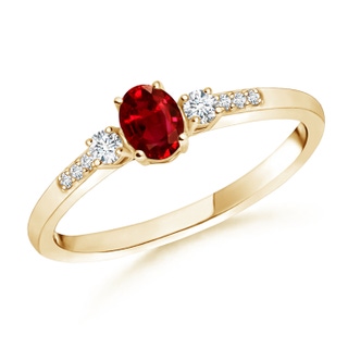 5x3mm AAAA Classic Oval Ruby and Round Diamond Three Stone Ring in Yellow Gold