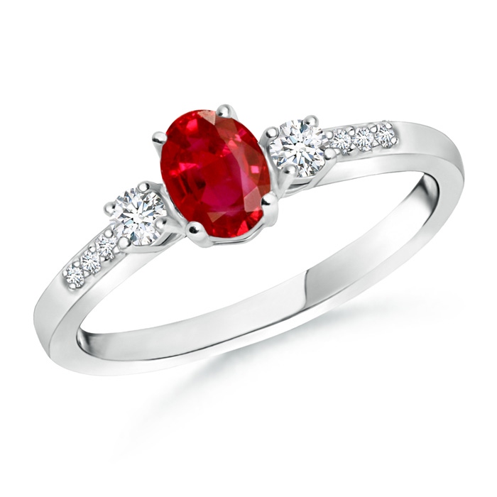 6x4mm AAA Classic Oval Ruby and Round Diamond Three Stone Ring in White Gold