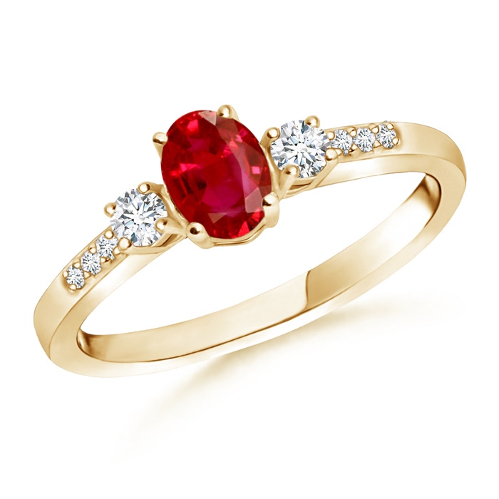 6x4mm AAA Classic Oval Ruby and Round Diamond Three Stone Ring in Yellow Gold