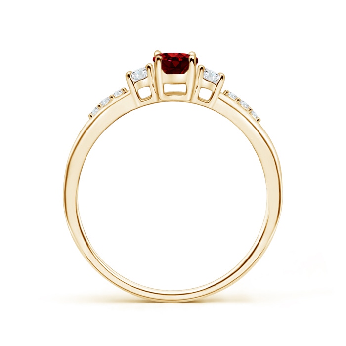 6x4mm AAAA Classic Oval Ruby and Round Diamond Three Stone Ring in Yellow Gold Product Image