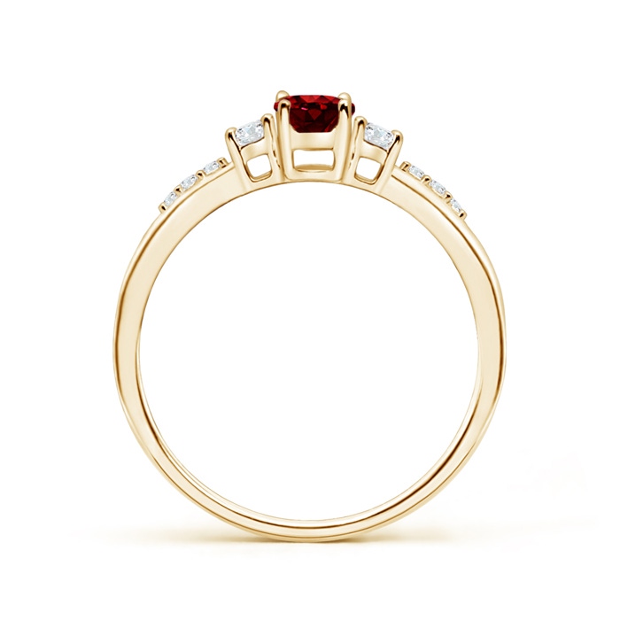 6x4mm AAAA Classic Oval Ruby and Round Diamond Three Stone Ring in Yellow Gold product image