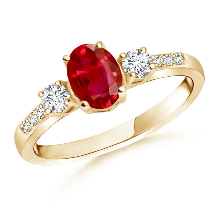 7x5mm AAA Classic Oval Ruby and Round Diamond Three Stone Ring in Yellow Gold 