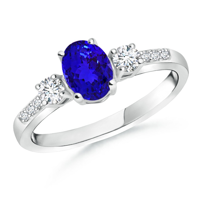 7x5mm AAAA Classic Oval Tanzanite and Round Diamond Three Stone Ring in White Gold