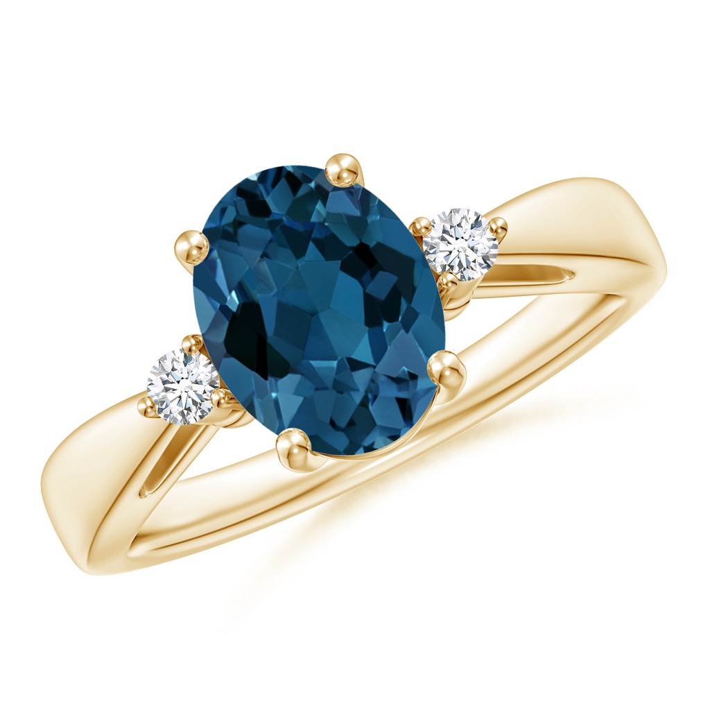9x7mm AAA Tapered Shank London Blue Topaz Ring with Diamond Accents in Yellow Gold