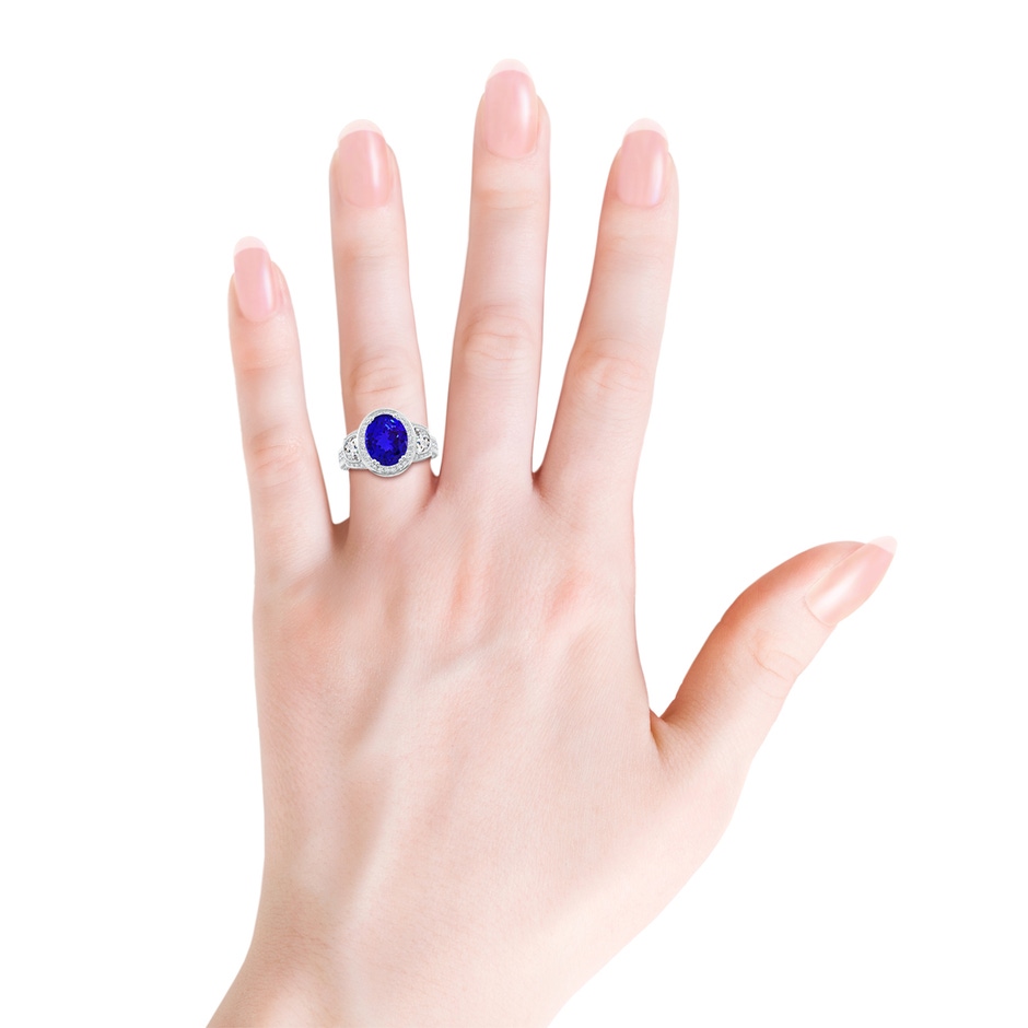 10x8mm AAAA Oval Tanzanite Three Stone Ring with Diamonds in White Gold product image