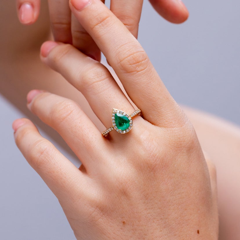 Prong-Set Pear Emerald Ring with Diamond Halo