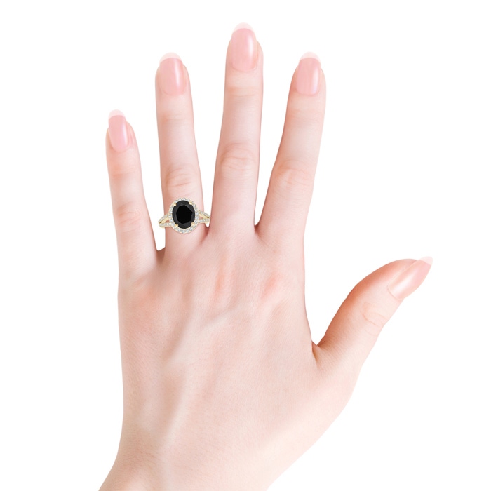 10x8mm AAA Oval Black Onyx Split Shank Halo Ring in Yellow Gold product image