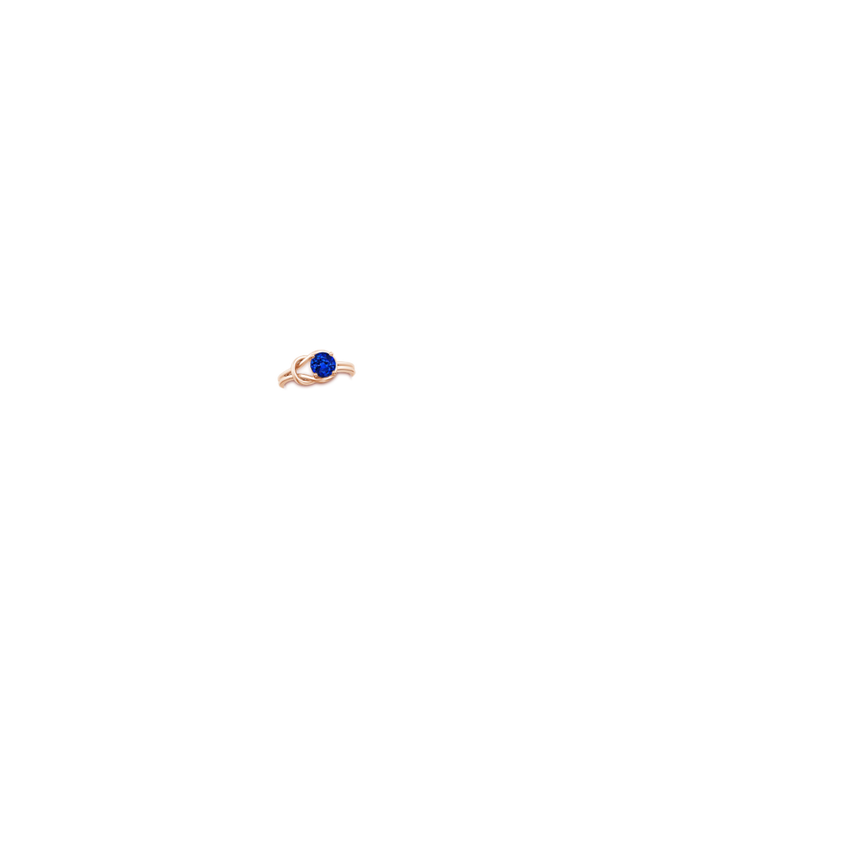 6mm AAAA Solitaire Blue Sapphire Infinity Knot Ring in Rose Gold hand