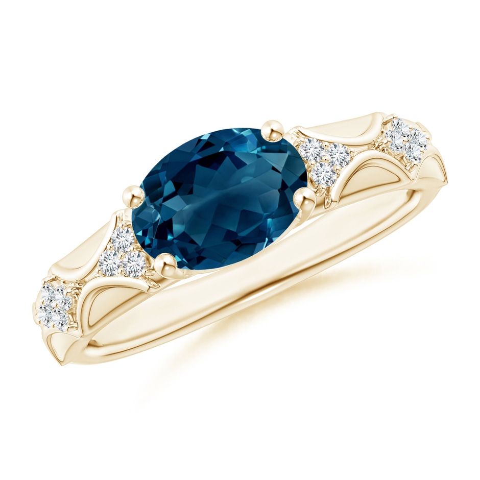 9x7mm AAAA Oval London Blue Topaz Vintage Style Ring with Diamond Accents in Yellow Gold 