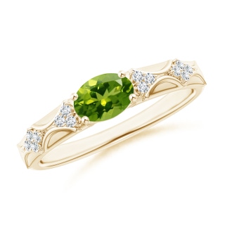 7x5mm AAAA Oval Peridot Vintage Style Ring with Diamond Accents in 9K Yellow Gold