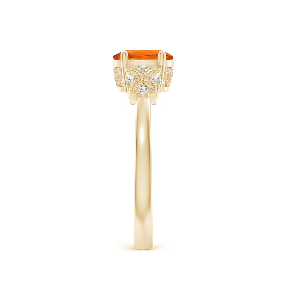 7x5mm AAAA Vintage Style Oval Orange Sapphire Ring with Diamonds in 9K Yellow Gold body-hand