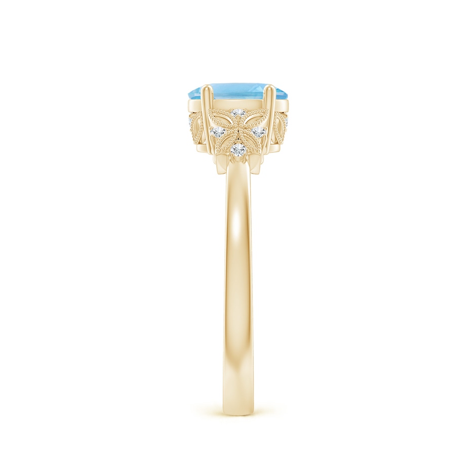 7x5mm A Vintage Style Oval Swiss Blue Topaz Ring with Diamonds in Yellow Gold side 299
