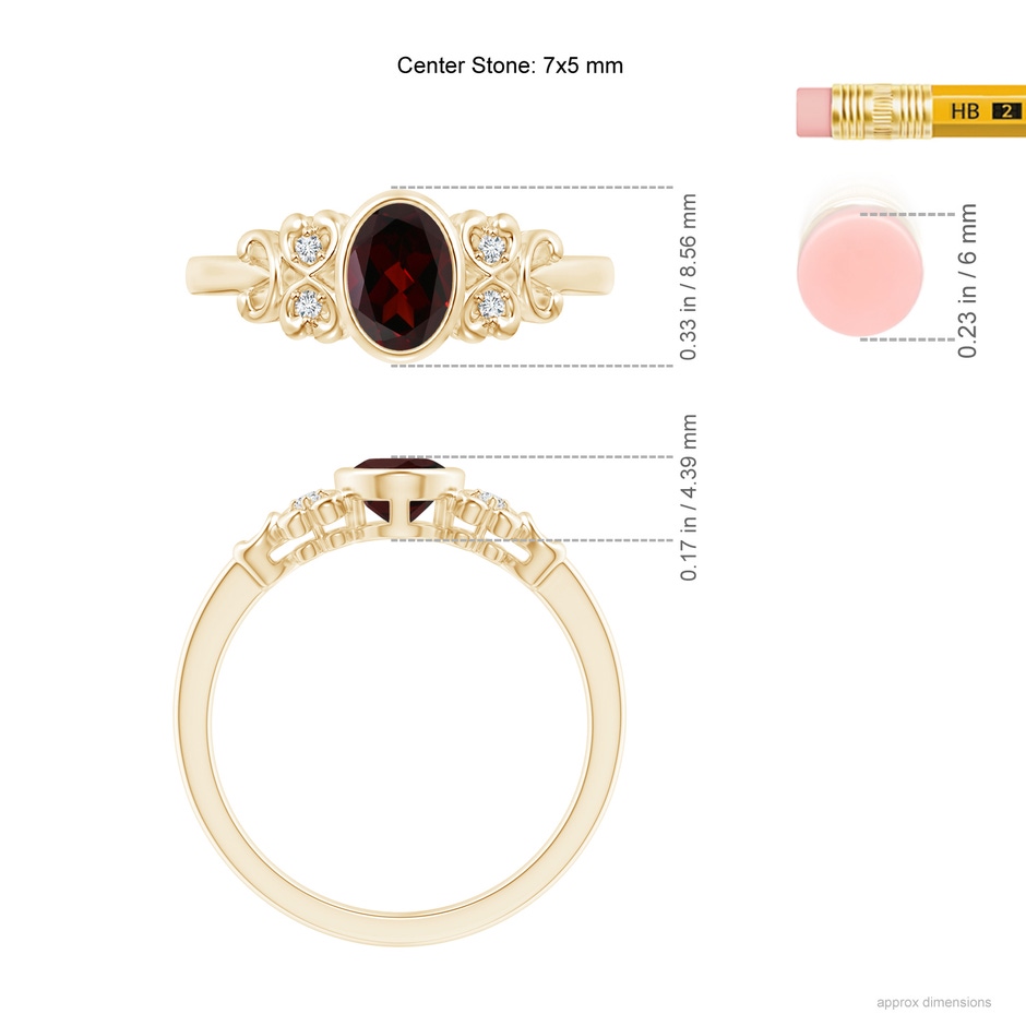 7x5mm A Vintage Style Bezel-Set Oval Garnet Ring with Diamonds in Yellow Gold ruler