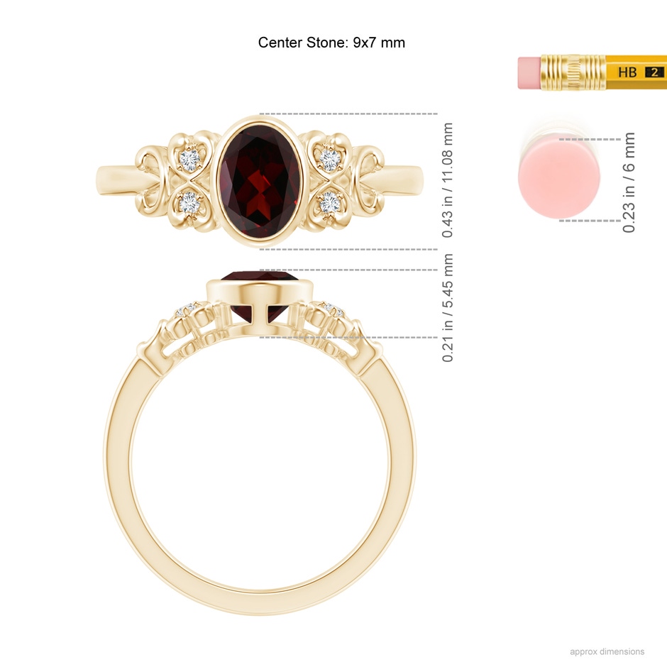 9x7mm A Vintage Style Bezel-Set Oval Garnet Ring with Diamonds in Yellow Gold ruler