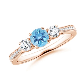 5mm A Cathedral Three Stone Swiss Blue Topaz Engagement Ring in 9K Rose Gold