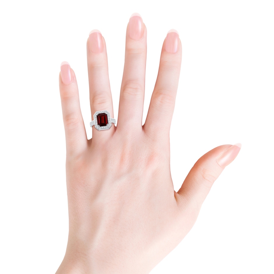 10x8mm AAA Emerald-Cut Garnet Engagement Ring with Diamond Halo in White Gold body-hand
